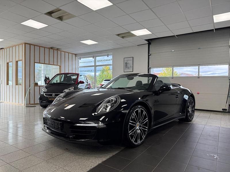 Schwarz Gebraucht 2015 Porsche 911 Carrera 4 Cabriolet Black Edition Cabrio | 84.999 € (Superpreis) - Bild 1/4
