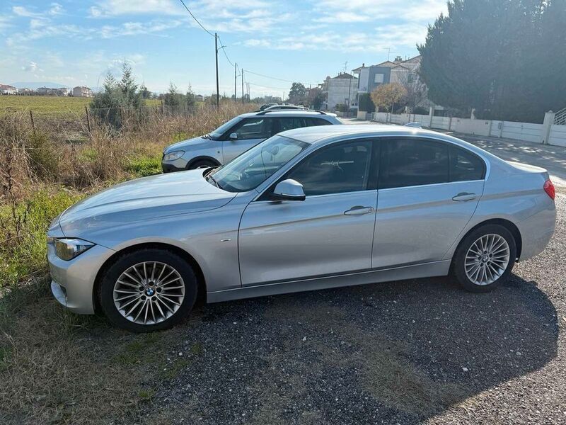 Silber Gebraucht 2013 BMW 316 Luxury Line Limousine | 21.000 € - Bild 1/4