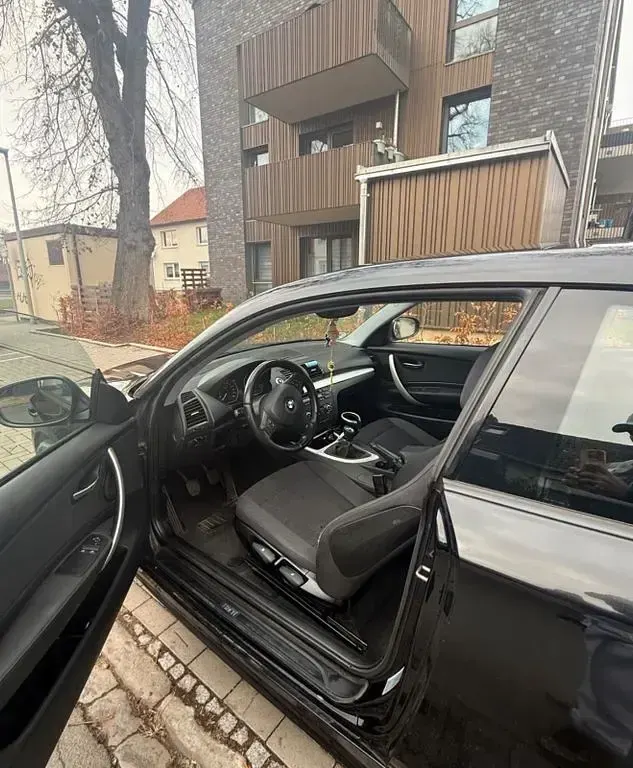 Gebraucht BMW 116 116 PS (85 kW) 2010 Schwarz Kleinwagen