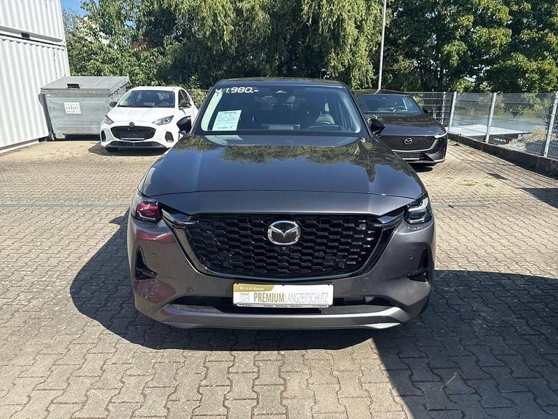 Machine grey (metallic) Gebraucht 2023 Mazda CX-60 Homura-Line SUV | 41.980 € (Guter Preis) - Bild 1/4