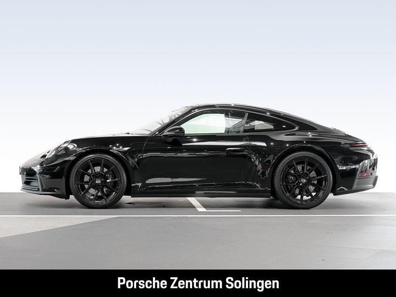 Gebraucht Porsche 992 394 PS (289 kW) 2024 Schwarz Coupé