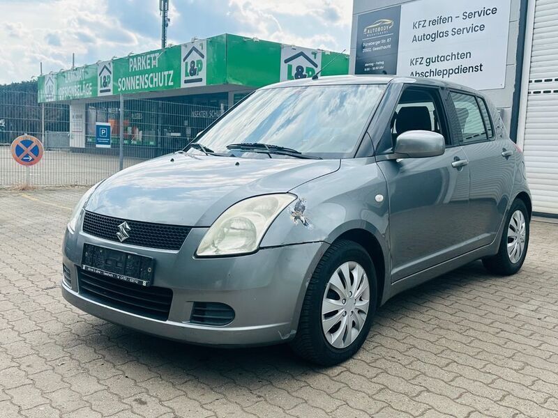 Grau Gebraucht 2006 Suzuki Swift Snow Limousine | 2.999 € (Etwas zu teuer) - Bild 1/4
