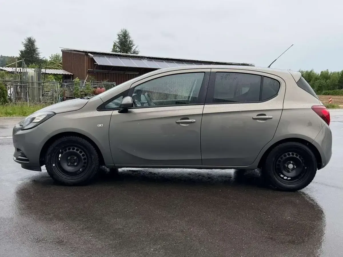 Używany Opel Corsa Edition 90 KM (66 kW) 2015 Brązowy Hatchback