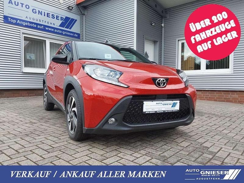Chili red Neu 2025 Toyota Aygo X SUV | 18.490 € - Bild 1/4