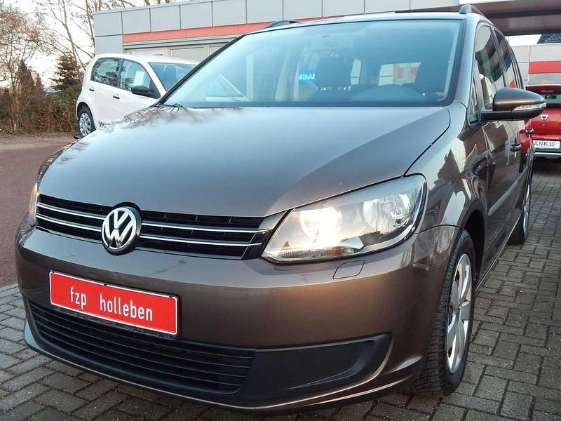 Toffee/graciosabraun Gebraucht 2011 VW Touran Trendline Van / Kleinbus | 5.980 € (Fairer Preis) - Bild 1/4