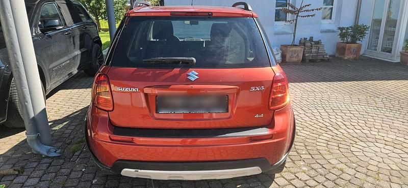 Orange Gebraucht 2010 Suzuki SX4 SUV | 2.450 € (Superpreis) - Bild 1/4