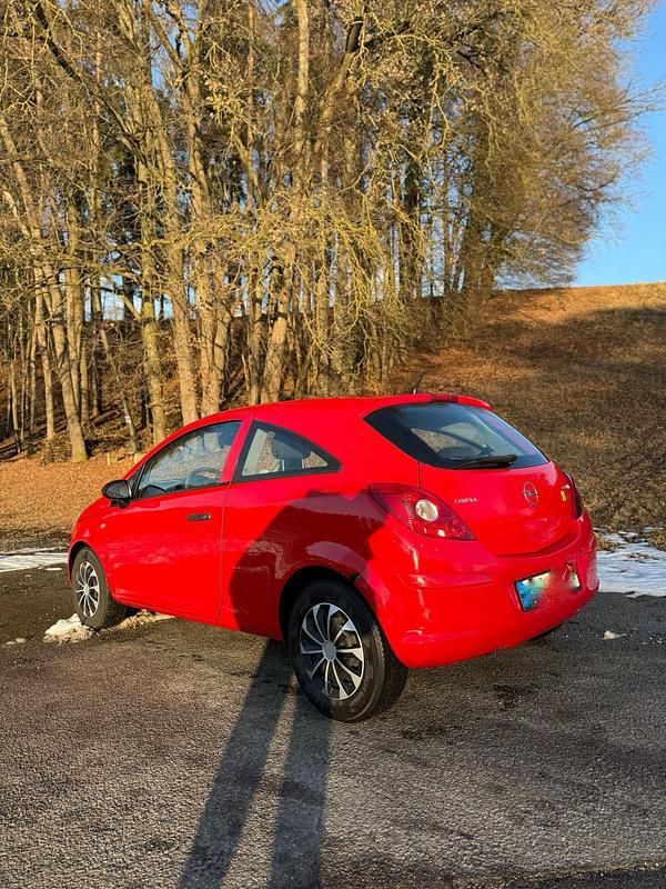 Rot Gebraucht 2009 Opel Corsa Kleinwagen | 1.000 € - Bild 1/4