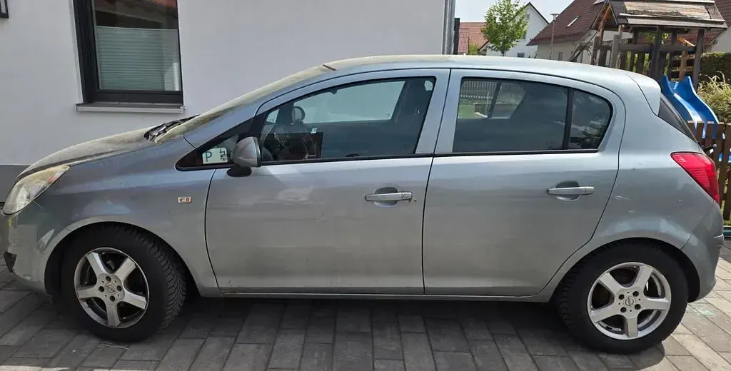 Używany Opel Corsa 75 KM (55 kW) 2010 Szary Hatchback