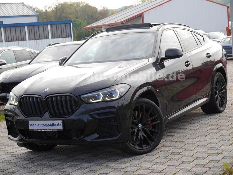 Black sapphire metallic Gebraucht 2022 BMW X6 M Sport SUV | 77.945 € - Bild 1/4
