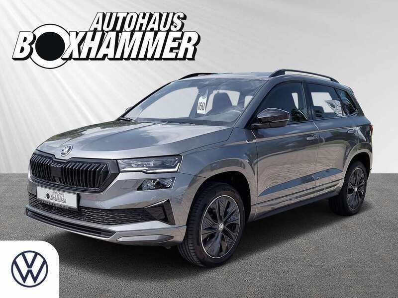 Grau Gebraucht 2024 Skoda Karoq SportLine SUV | 36.860 € (Teuer) - Bild 1/4
