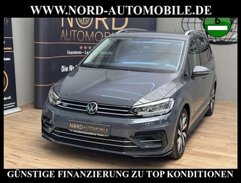 Delfingrau metallic (metallic) Gebraucht 2021 VW Touran R-line Van / Kleinbus | 27.900 € (Guter Preis) - Bild 1/3