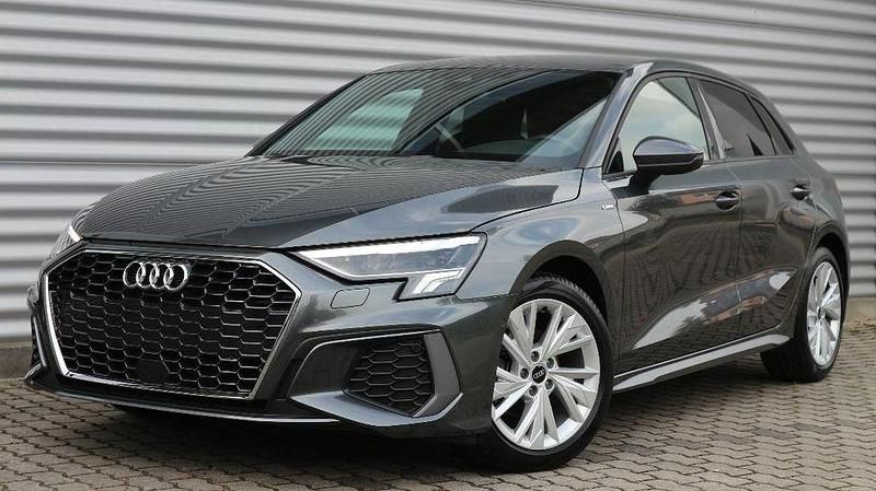 Grau Gebraucht 2024 Audi A3 Sportback S-Line Limousine | 32.830 € (Superpreis) - Bild 1/4