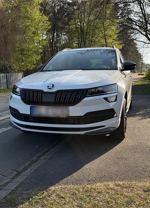 Weiß Gebraucht 2019 Skoda Karoq SportLine SUV | 23.499 € (Fairer Preis) - Bild 1/4