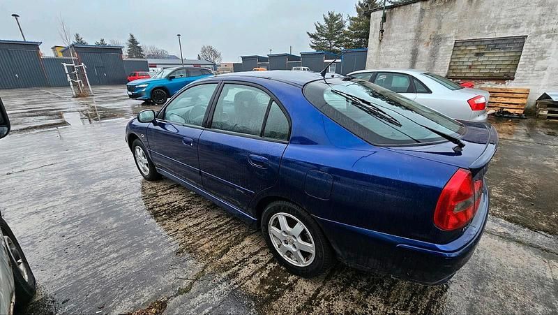 Gebraucht Mitsubishi Carisma 115 PS (84 kW) 2004 Blau Limousine