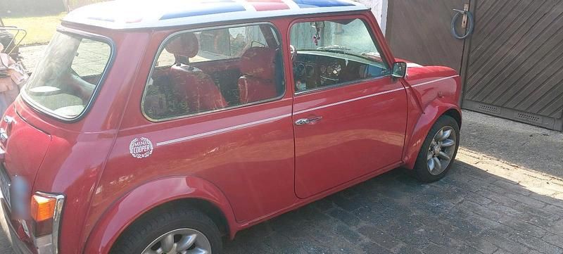 Second-hand Rover Mini 63 CP (46 kW) 1998 Roșu Hatchback