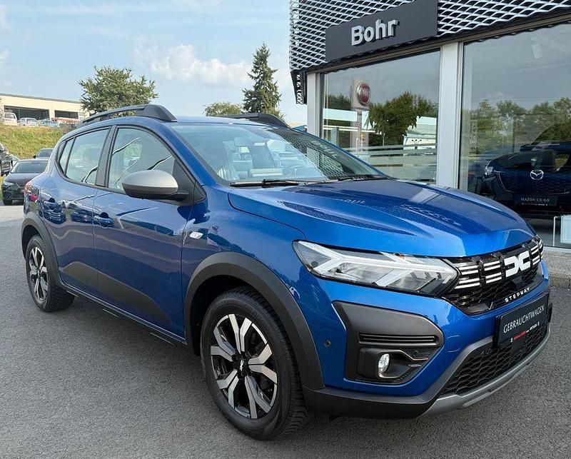 Blau Gebraucht 2023 Dacia Sandero Expression Kleinwagen | 15.880 € (Fairer Preis) - Bild 1/4