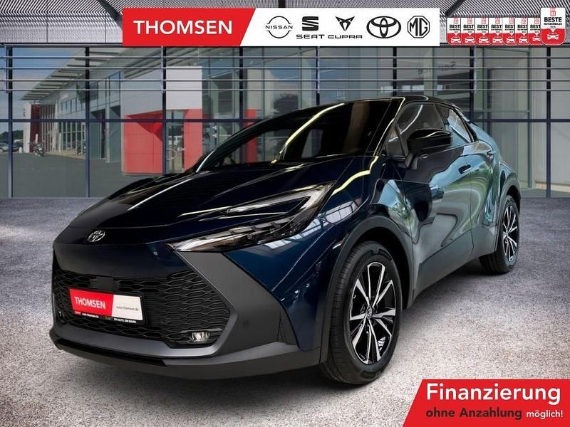 Dunkel türkisblau/ dach schwarz Gebraucht 2024 Toyota C-HR Team SUV | 33.975 € (Superpreis) - Bild 1/3