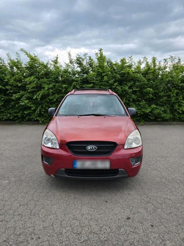 Rot Gebraucht 2008 Kia Carens Van / Kleinbus | 950 € (Superpreis) - Bild 1/4