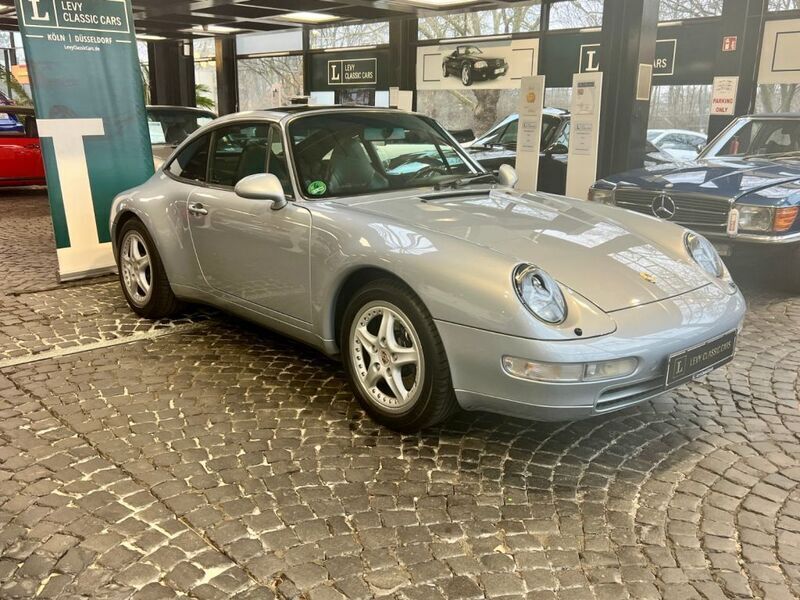 Polarsilber (metallic) Gebraucht 1996 Porsche 993 Cabrio | 79.800 € (Fairer Preis) - Bild 1/4