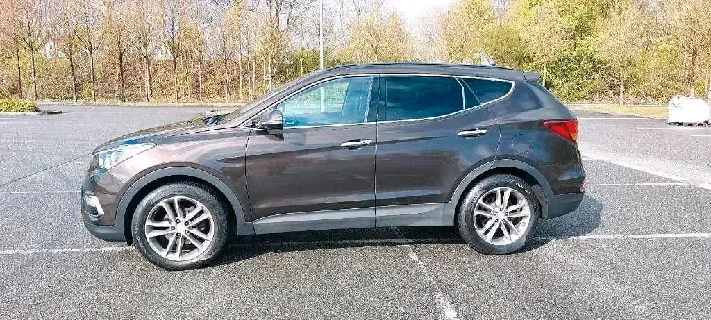 Gebraucht Hyundai Santa Fe Premium 200 PS (147 kW) 2016 Braun SUV