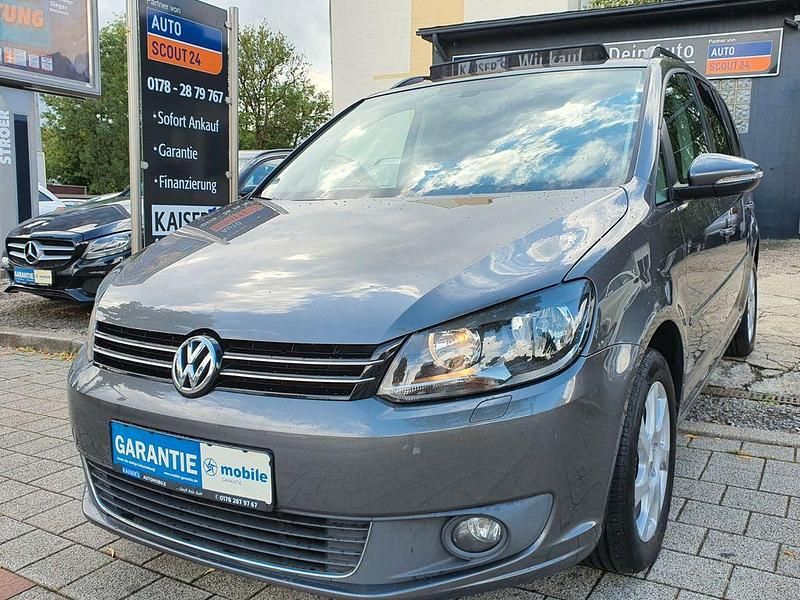 Grau Gebraucht 2012 VW Touran Style Van / Kleinbus | 5.999 € (Guter Preis) - Bild 1/4