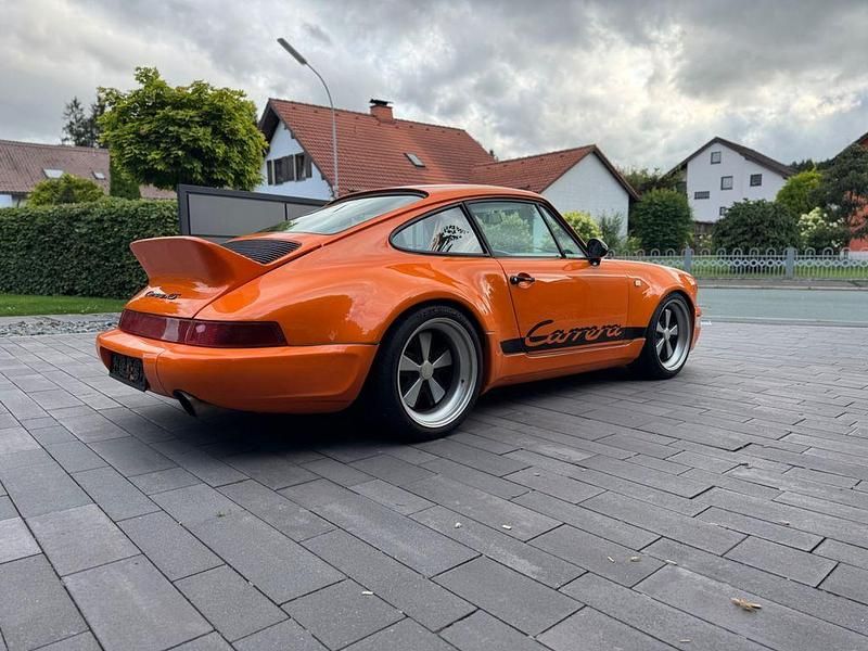 Orange Gebraucht 1990 Porsche 964 Coupé | 109.911 € - Bild 1/4
