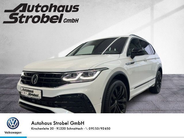 Oryxweiß perlmutteffekt Neu 2024 VW Tiguan Allspace R-line SUV | 56.850 € (Teuer) - Bild 1/4