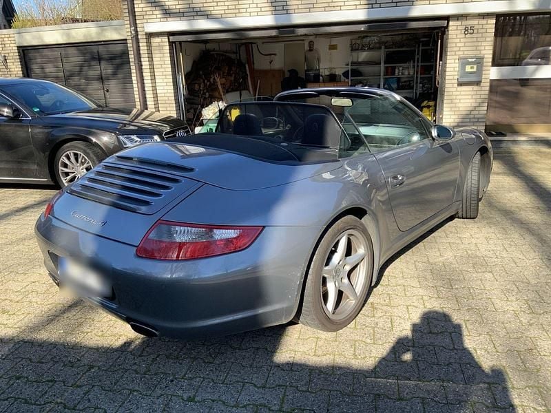 Second-hand Porsche 997 325 CP (239 kW) 2006 Argintiu Cabrio