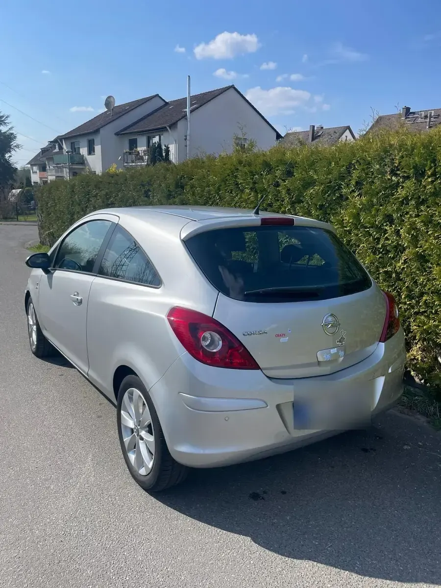 Używany Opel Corsa Active 87 KM (63 kW) 2013 Srebrny Hatchback