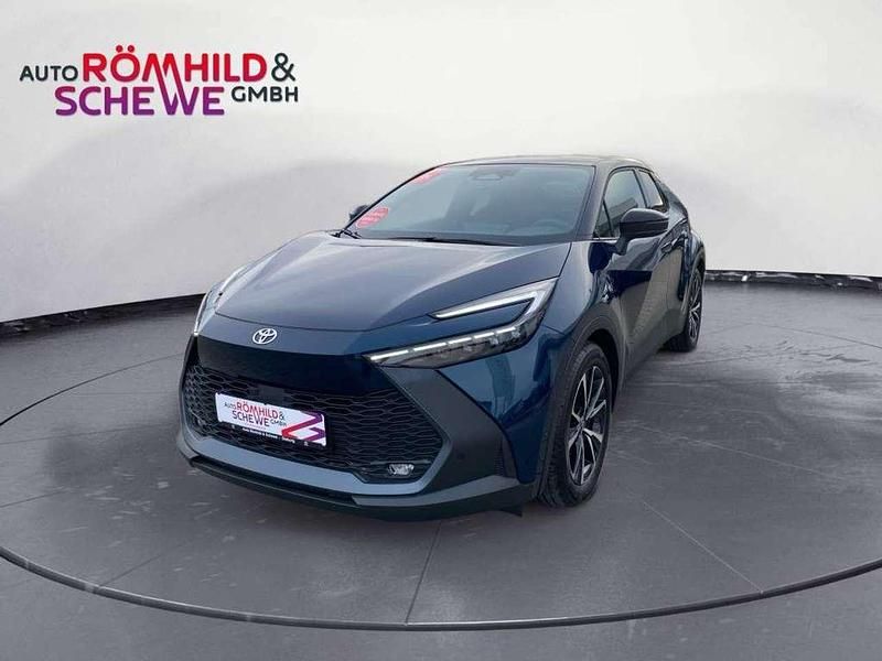 Midnight teal metallic/schwarz Gebraucht 2024 Toyota C-HR Team SUV | 37.990 € (Fairer Preis) - Bild 1/4