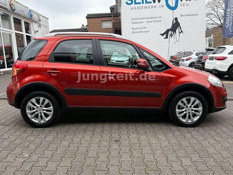 Gebraucht Suzuki SX4 Style 120 PS (88 kW) 2013 Orange Limousine