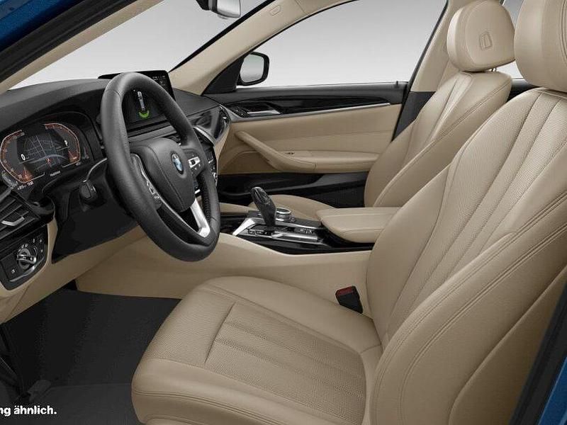 Gebraucht BMW 520 Efficient Dynamics 197 PS (144 kW) 2023 Phytonicblau Kombi