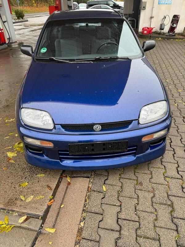 Blau Gebraucht 1995 Mazda 323C Coupé | 1.699 € - Bild 1/4