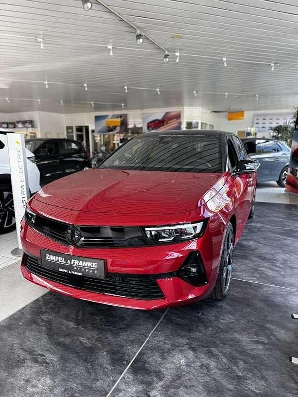 Kardio rot metallic Neu 2025 Opel Astra Kombi | 39.044 € (Teuer) - Bild 1/3