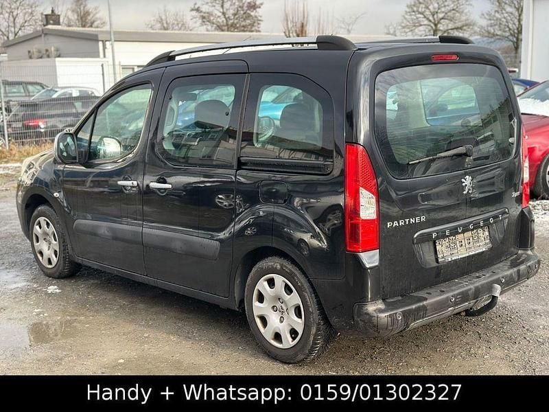 Gebraucht Peugeot Partner Tepee Tendance 90 PS (66 kW) 2010 Schwarz Van / Kleinbus