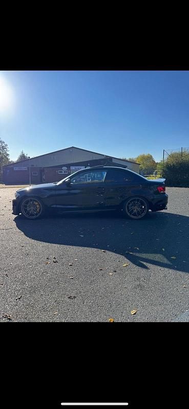 Schwarz Gebraucht 2011 BMW 135 Coupé M Performance Coupé | 15.500 € - Bild 1/4