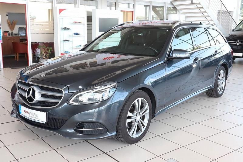 Tenoritgrau Gebraucht 2013 Mercedes E200 Kombi | 16.999 € (Fairer Preis) - Bild 1/4
