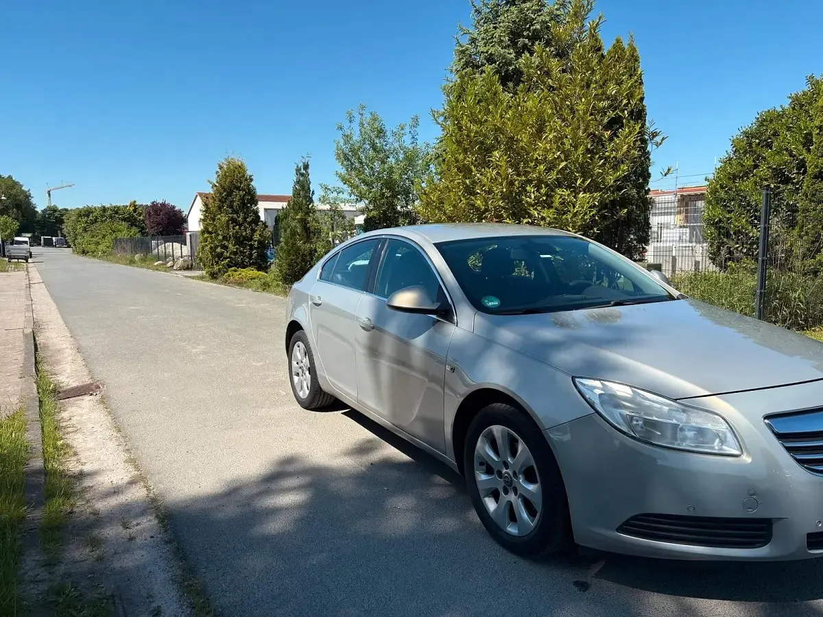 Używany Opel Insignia 115 KM (84 kW) 2010 Szary Sedan/Limuzyna