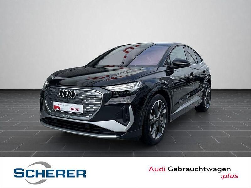Mythosschwarz metallic (metallic) Gebraucht 2022 Audi Q4 Sportback e-tron Ambiente SUV | 33.290 € (Guter Preis) - Bild 1/4