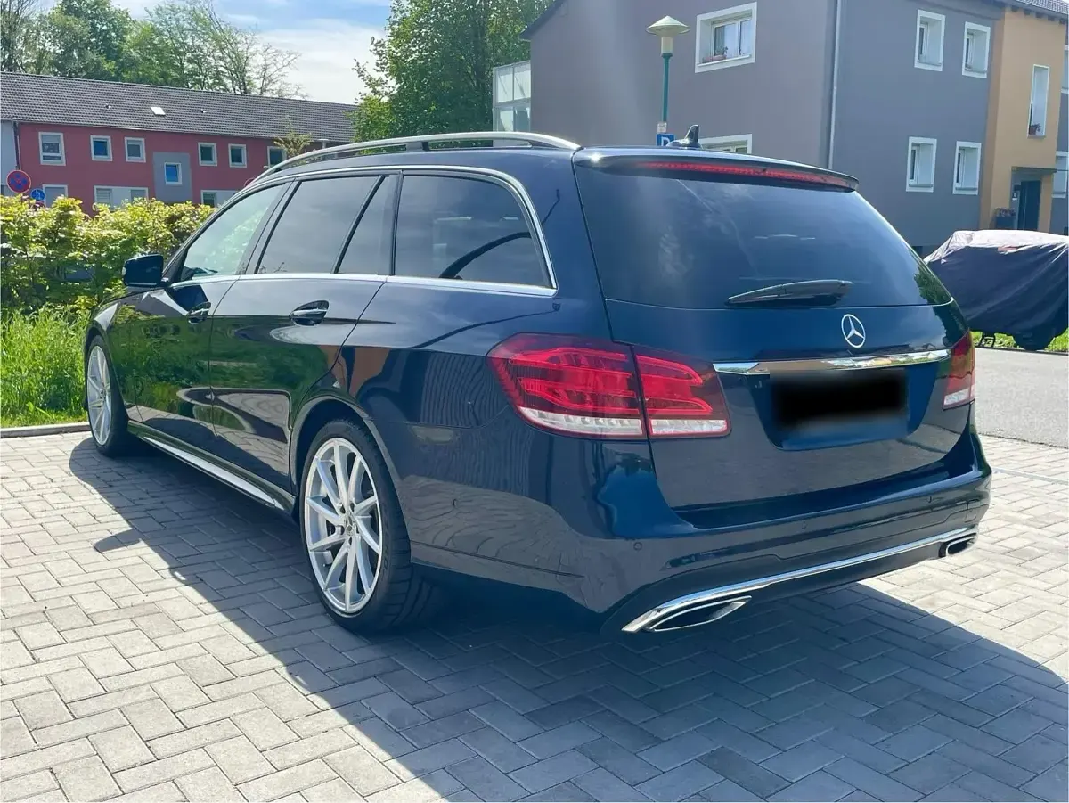 Second-hand Mercedes E250 204 CP (150 kW) 2013 Albastru Break