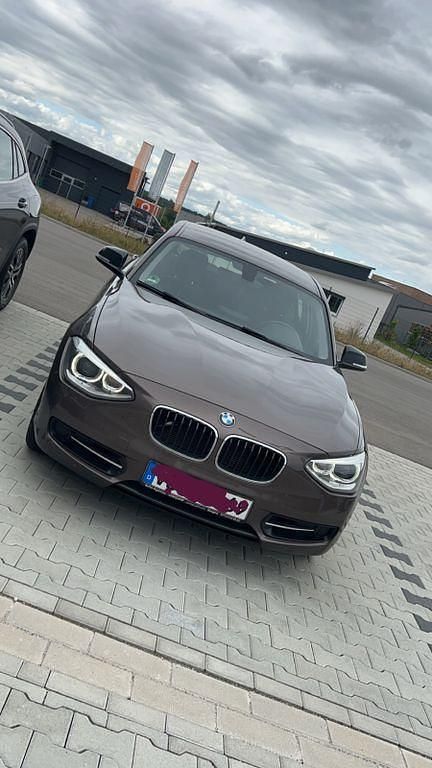 Braun Gebraucht 2014 BMW 118 Sport Line Kleinwagen | 9.700 € (Fairer Preis) - Bild 1/4