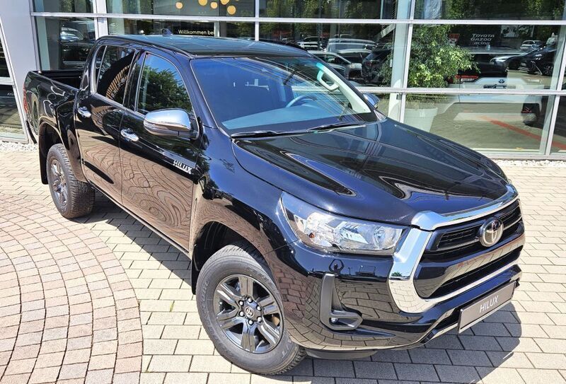 Schwarz Neu 2024 Toyota HiLux Comfort Abholung | 42.490 € (Superpreis) - Bild 1/4