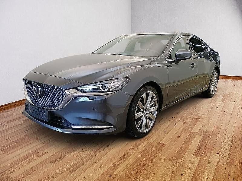 Machine gray (metallic) Gebraucht 2024 Mazda 6 Takumi-Line Limousine | 30.900 € (Guter Preis) - Bild 1/4