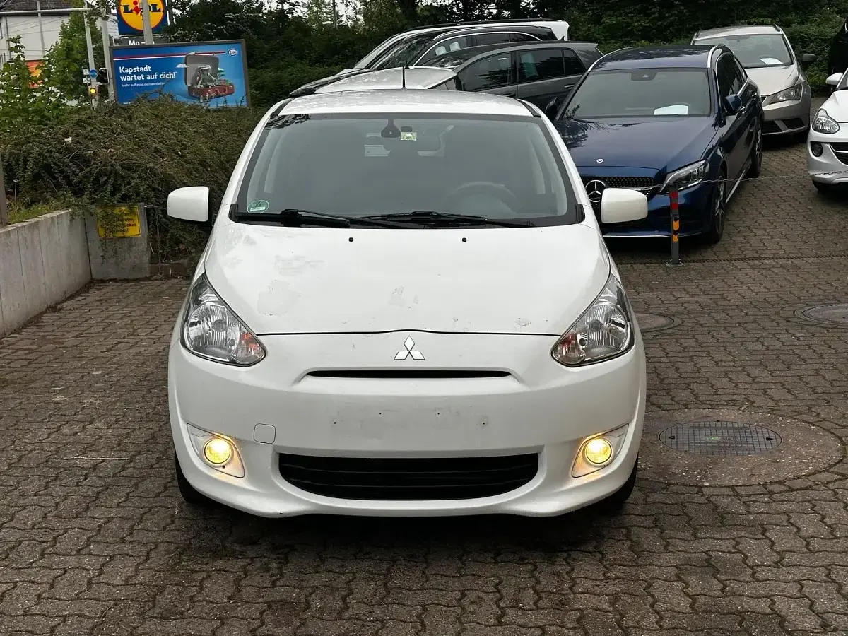 Begagnad Mitsubishi Space Star 80 HK (58 kW) 2016 Vit Halvkombi