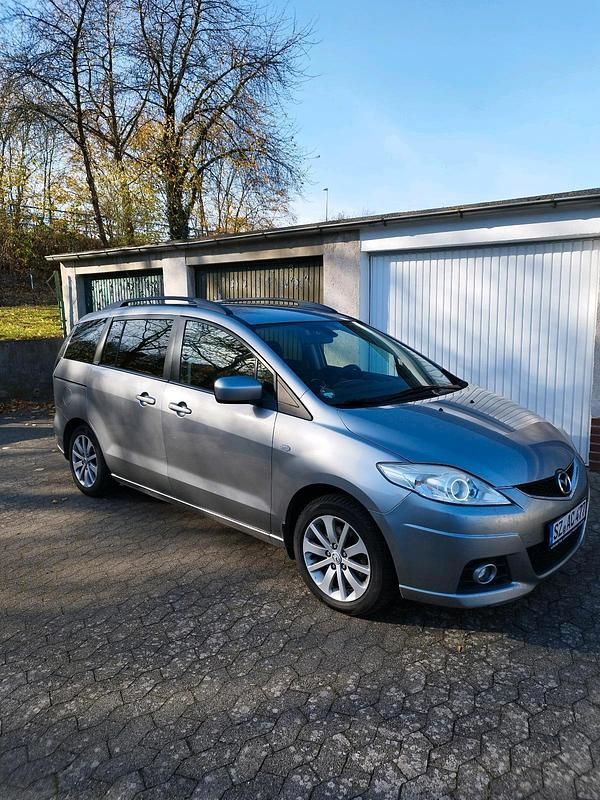 Grau Gebraucht 2010 Mazda 5 Van / Kleinbus | 2.999 € (Fairer Preis) - Bild 1/4