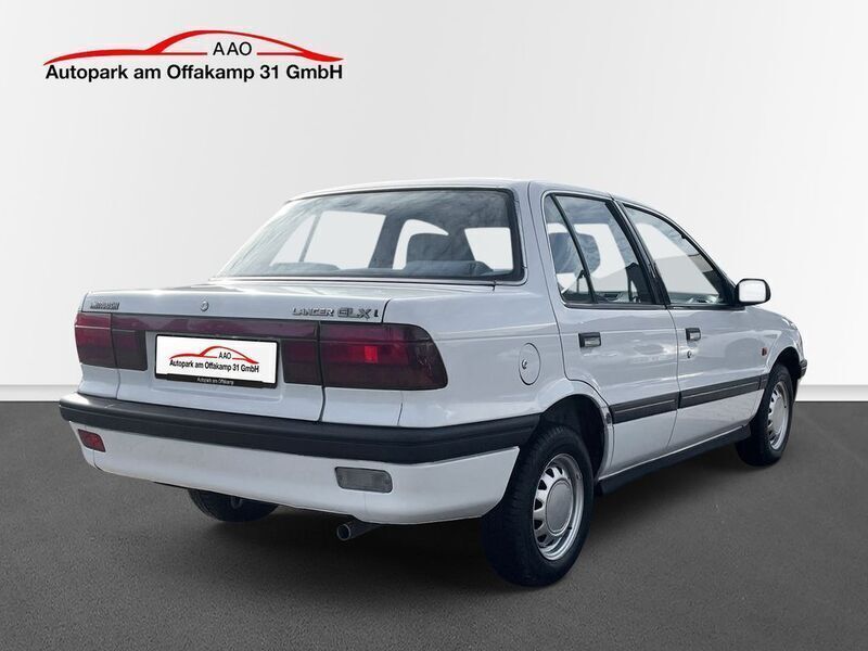Second-hand Mitsubishi Lancer 90 CP (66 kW) 1992 Alb Berlinǎ