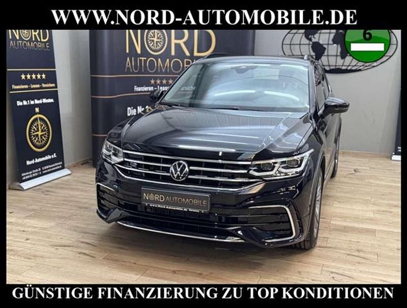 Deep black perleffek (metallic) Gebraucht 2023 VW Tiguan R-line SUV | 34.800 € (Superpreis) - Bild 1/3