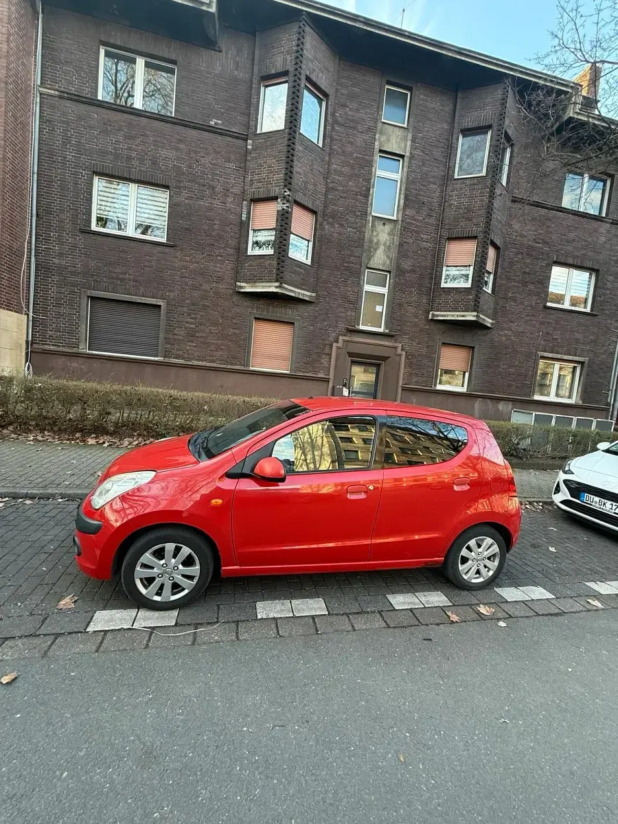 Gebraucht Nissan Pixo 68 PS (50 kW) 2012 Rot Kleinwagen