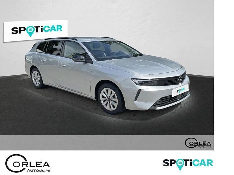 Black (metallic) Gebraucht 2024 Opel Astra Enjoy Kombi | 20.990 € (Guter Preis) - Bild 1/4