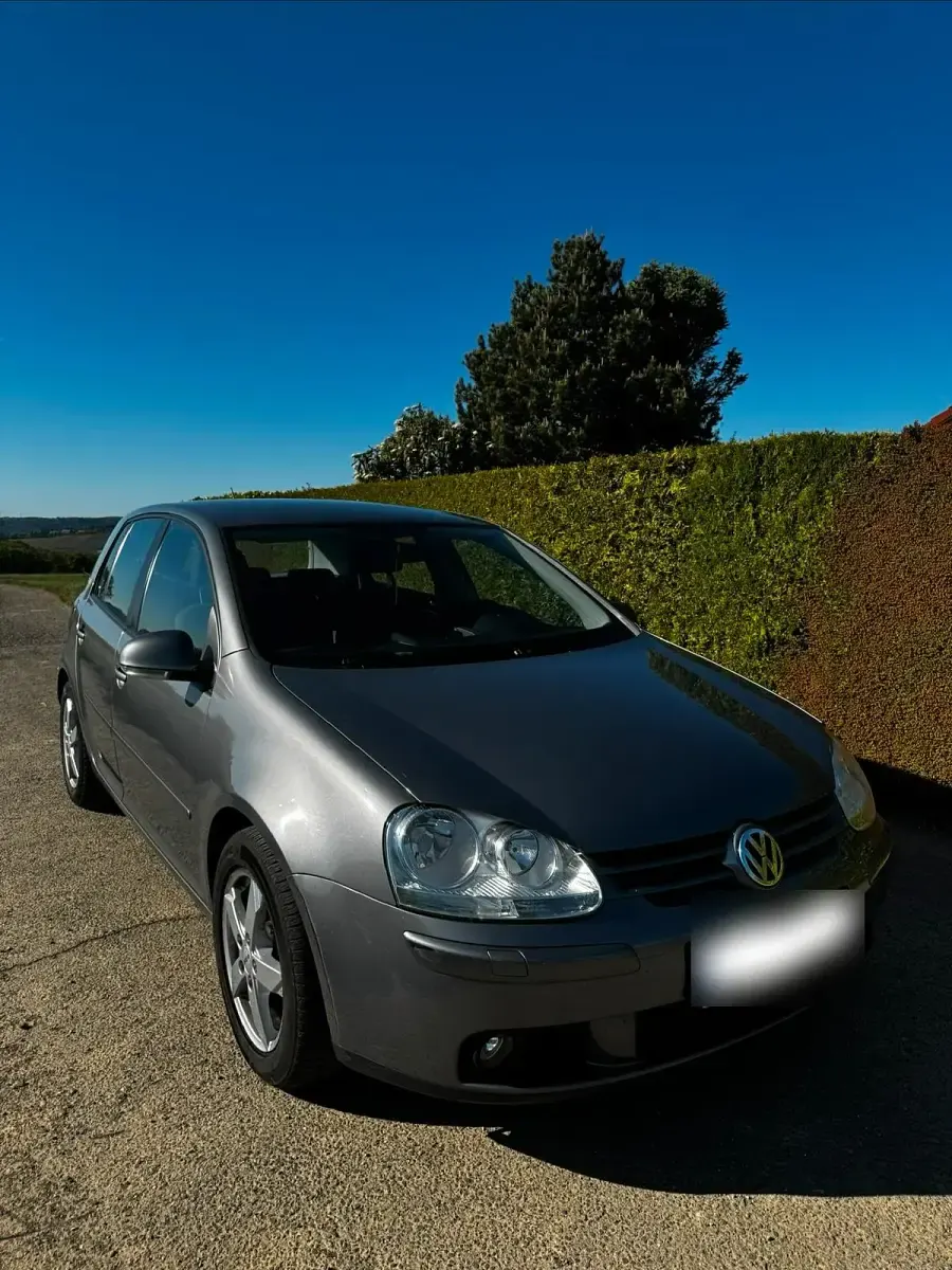 Second-hand VW Golf V 105 CP (77 kW) 2007 Alb Break